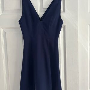 Short navy blue dress with lace on back